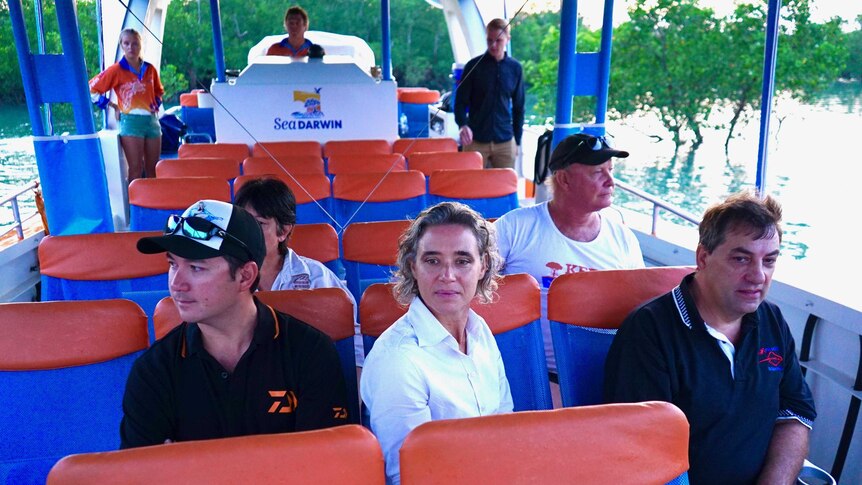 Environmental stakeholders on a boat in Darwin Harbour