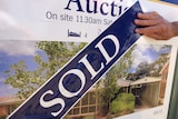 Sold strip added to house 'for sale' sign in Canberra, 12 Sept 2015
