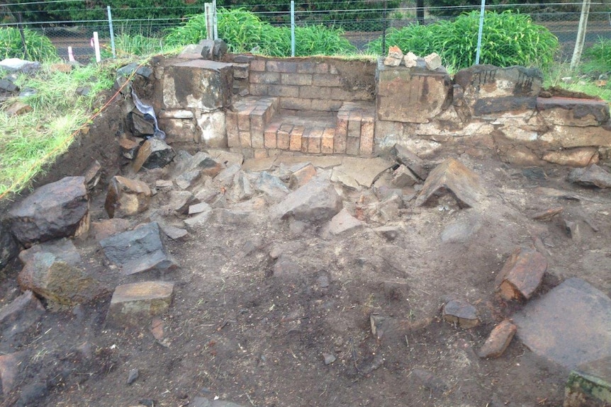 Wall and fireplace from superintendent’s cottage at Kerry Lodge