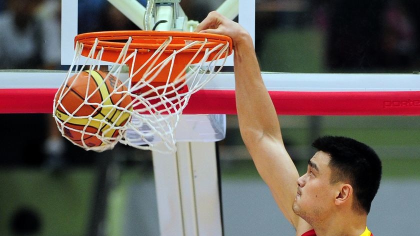Yao Ming slam dunks