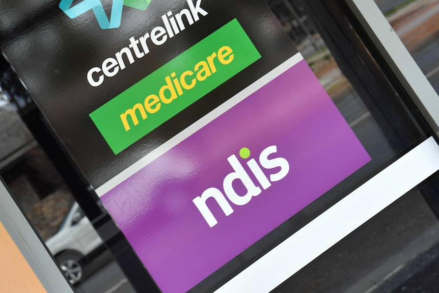 The NDIS logo, along with the Medicare and Centrelink logos