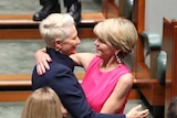 Julie Bishop and Kerryn Phelps embrace in Parliament