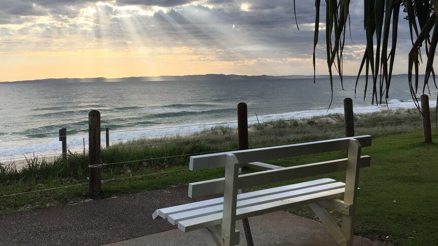 Bench on Woorim Beach looking out to the ocean