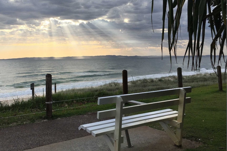 Bench on Woorim Beach looking out to the ocean