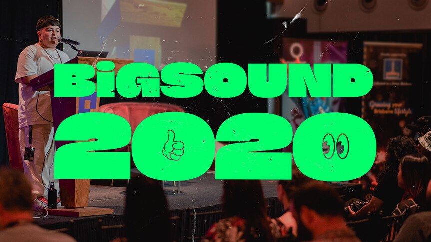 Mo'ju giving their keynote address at BIGSOUND 2019 with a logo of BIGSOUND 2020