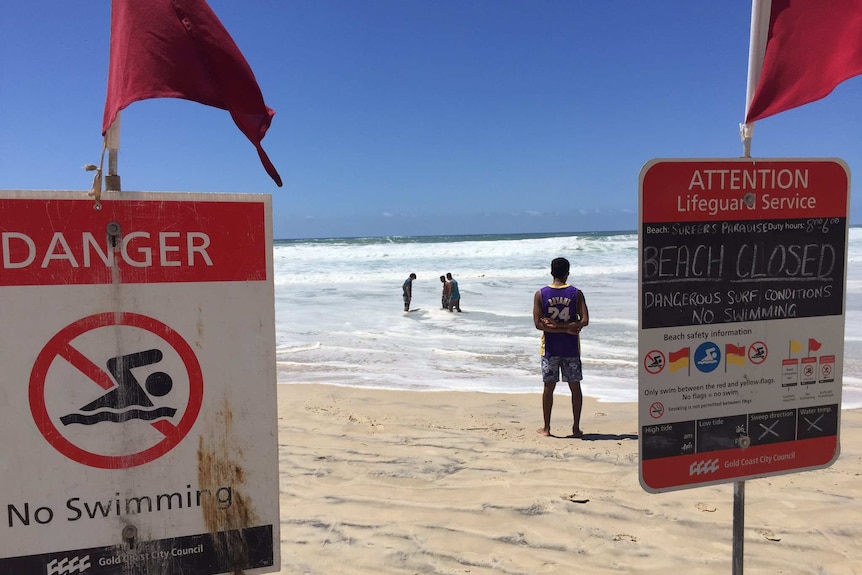 Swimmers are staying out of the water in Surfers Paradise amid the dangerous surf warnings.