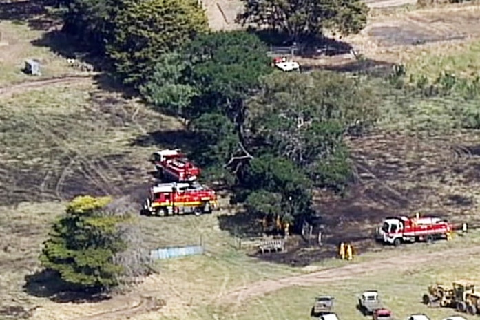 Aerial view of burnt grass and fire trucks at a grass fire at Anakie.