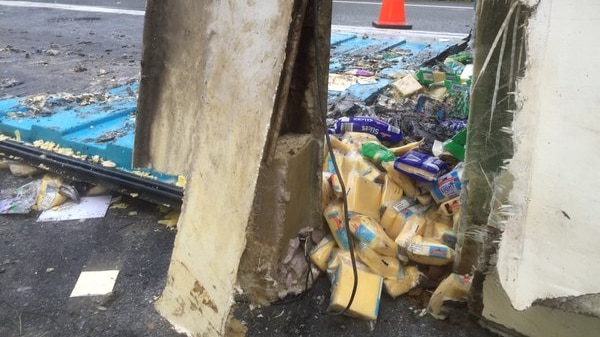 Cheese spilling out of the side of a truck after a crash at Jerrawangala, in the NSW Illawarra.