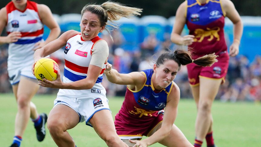 Angelica Gogos (left) of the Bulldogs in action against Brisbane in February 2018.