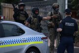 Special Operations Group Tasmania members at siege in Launceston.