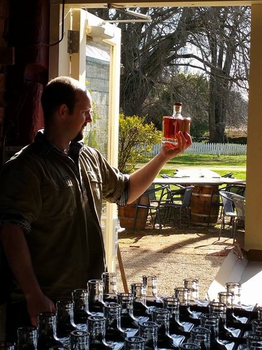 Head Distiller Dean Jackson with bottle no.1