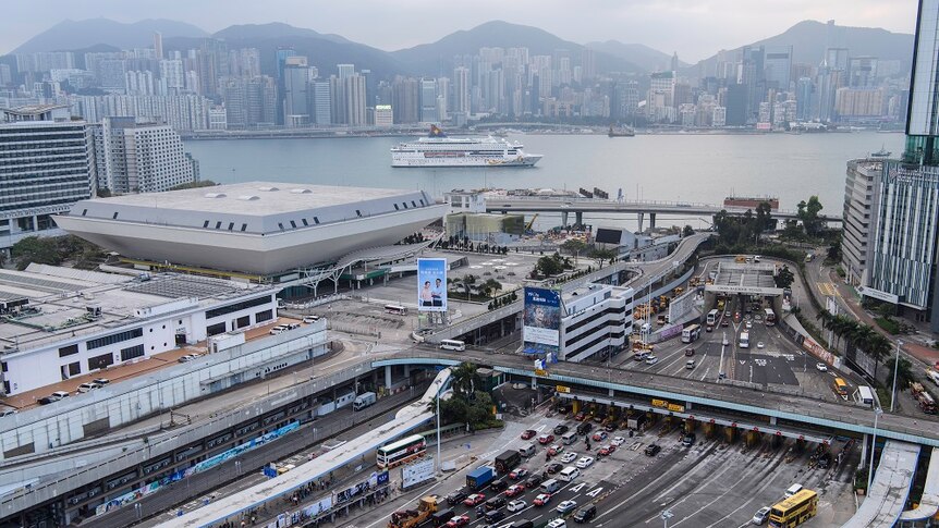 Tunnel in Hong Kong reopens, filled with lots of cars.