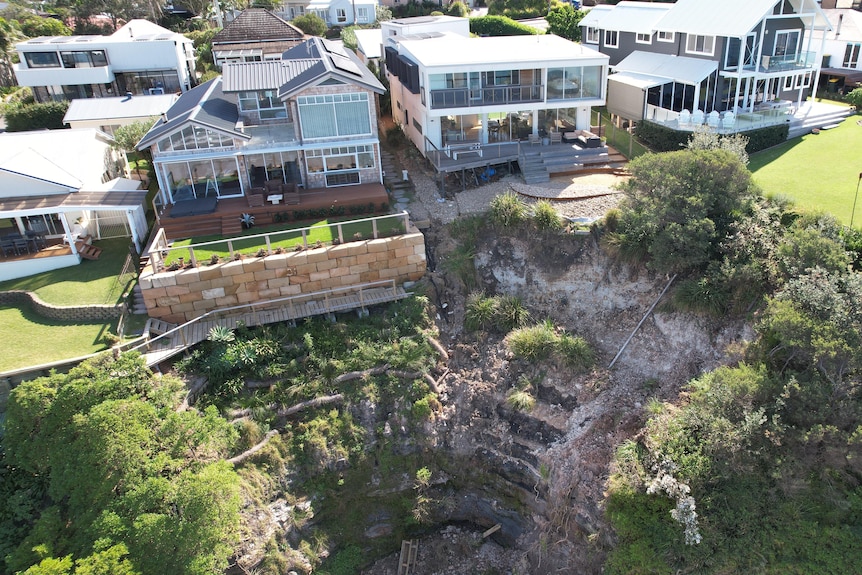 Houses on a cliff edge in the northern Illawarra region.