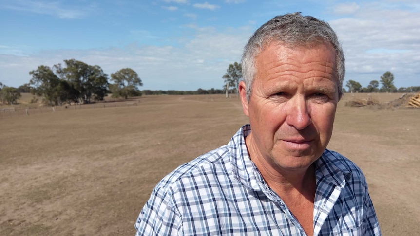 Farmer John Freeman standing in one of his dry paddocks at Briagolong in Victoria's east.