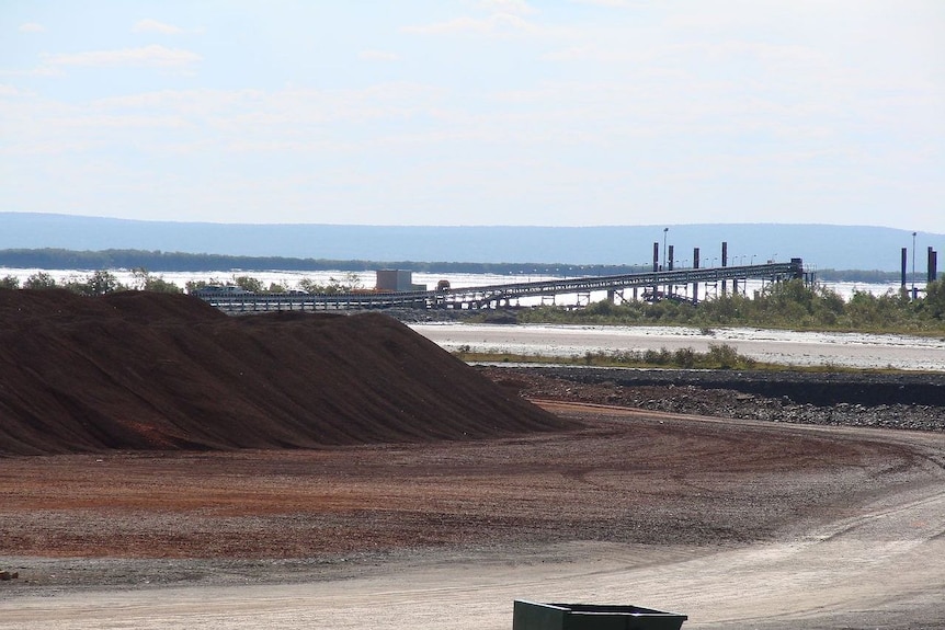 An iron ore loader in operation.