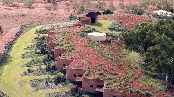 A suite of rooms built into a Pilbara sand dune.