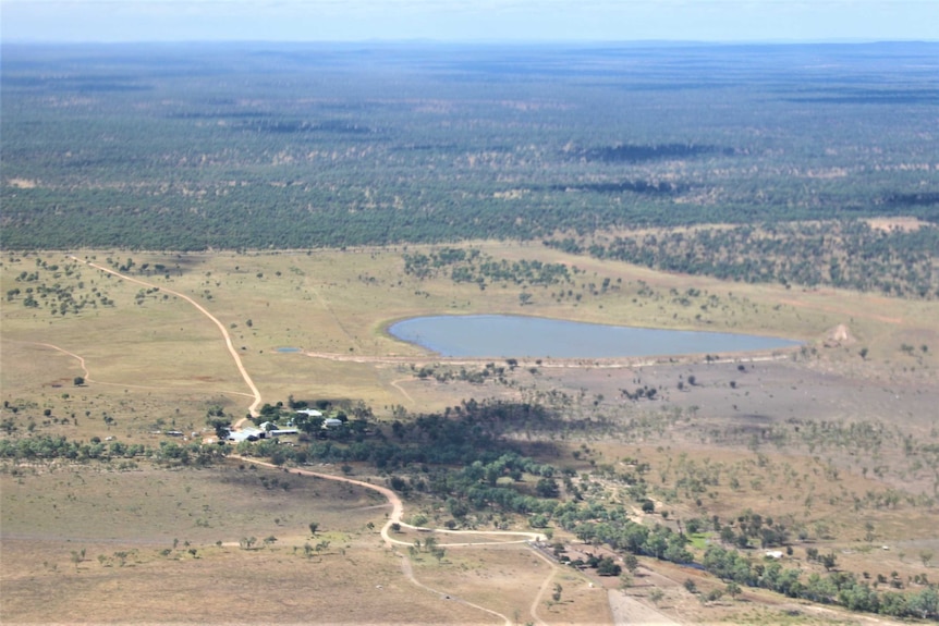 Aerial photo of homestead and dam on sprawling cattle station.