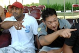 Myuran Sukumaran and Andrew Chan sit inside Kerobokan prison