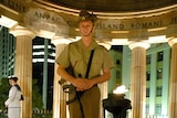 The Guard stands in the Cenotaph in Brisbane during the Anzac Day dawn service ceremony.
