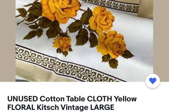 An eBay ad showing the vintage yellow floral table cloth material Facebook users found