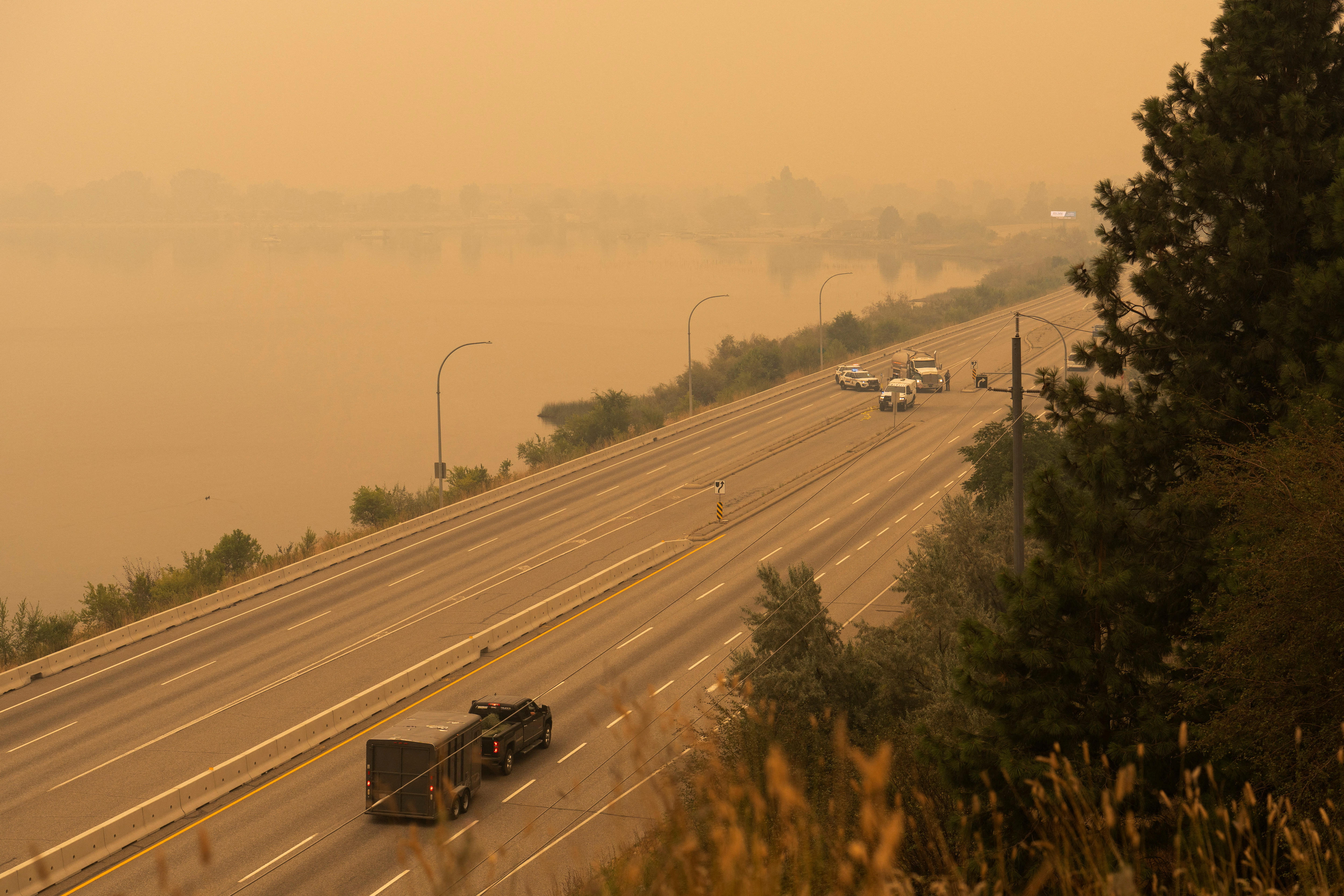 Wildfire forces more than 20,000 people evacuate homes in western Canada
