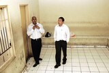 Myuran Sukumaran and Andrew Chan wait in a holding cell at Denpasar Court.