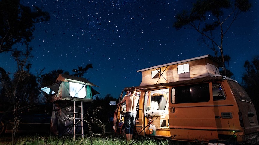 Campervan lit up at night