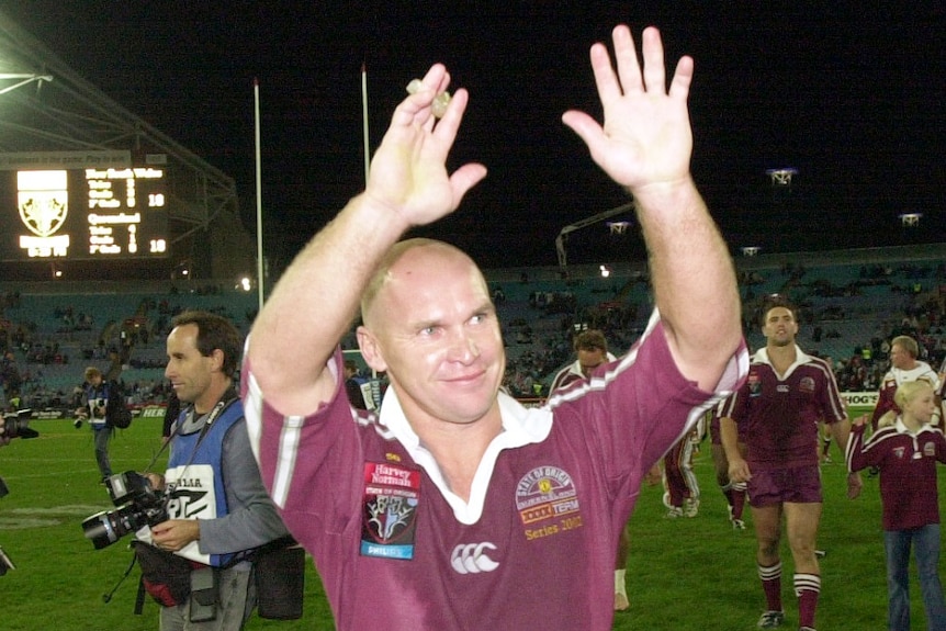 Allan Langer waves to the crowd after State of Origin 3 in Sydney in 2002.