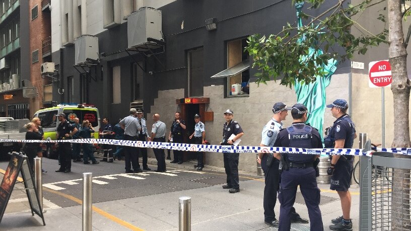 The man is believed to be critically injured after being shot in Brisbane's city.