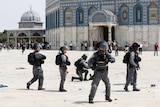Israeli police stand in position in the al-Aqsa Mosque compound