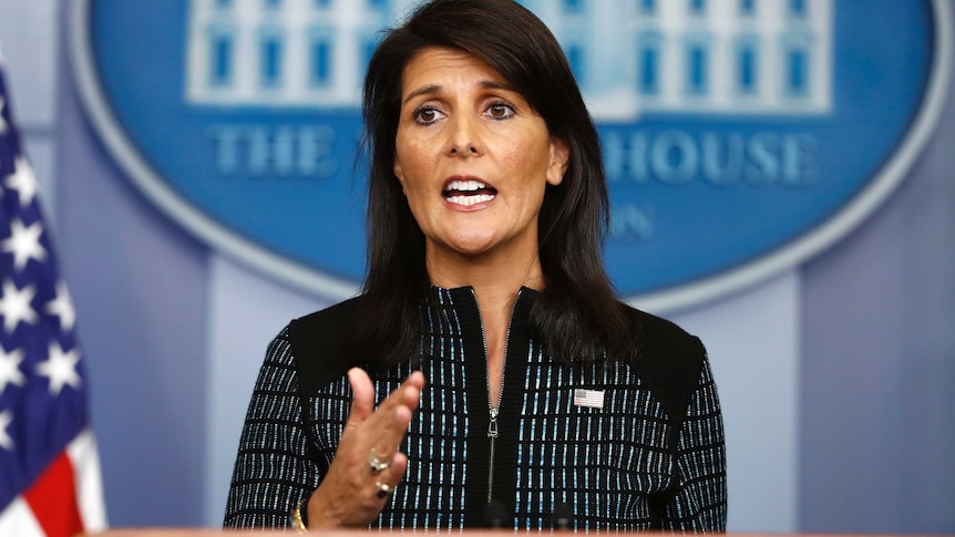 US Ambassador to the United Nations Nikki Haley makes a hand gesture as she speaks during a news briefing at the White House.