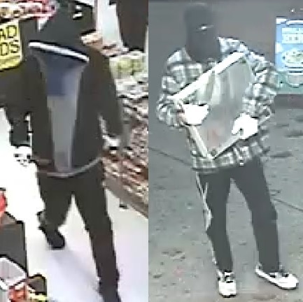 Security camera image of two men during a Isabella Plains supermarket robbery on June 15, 2014.