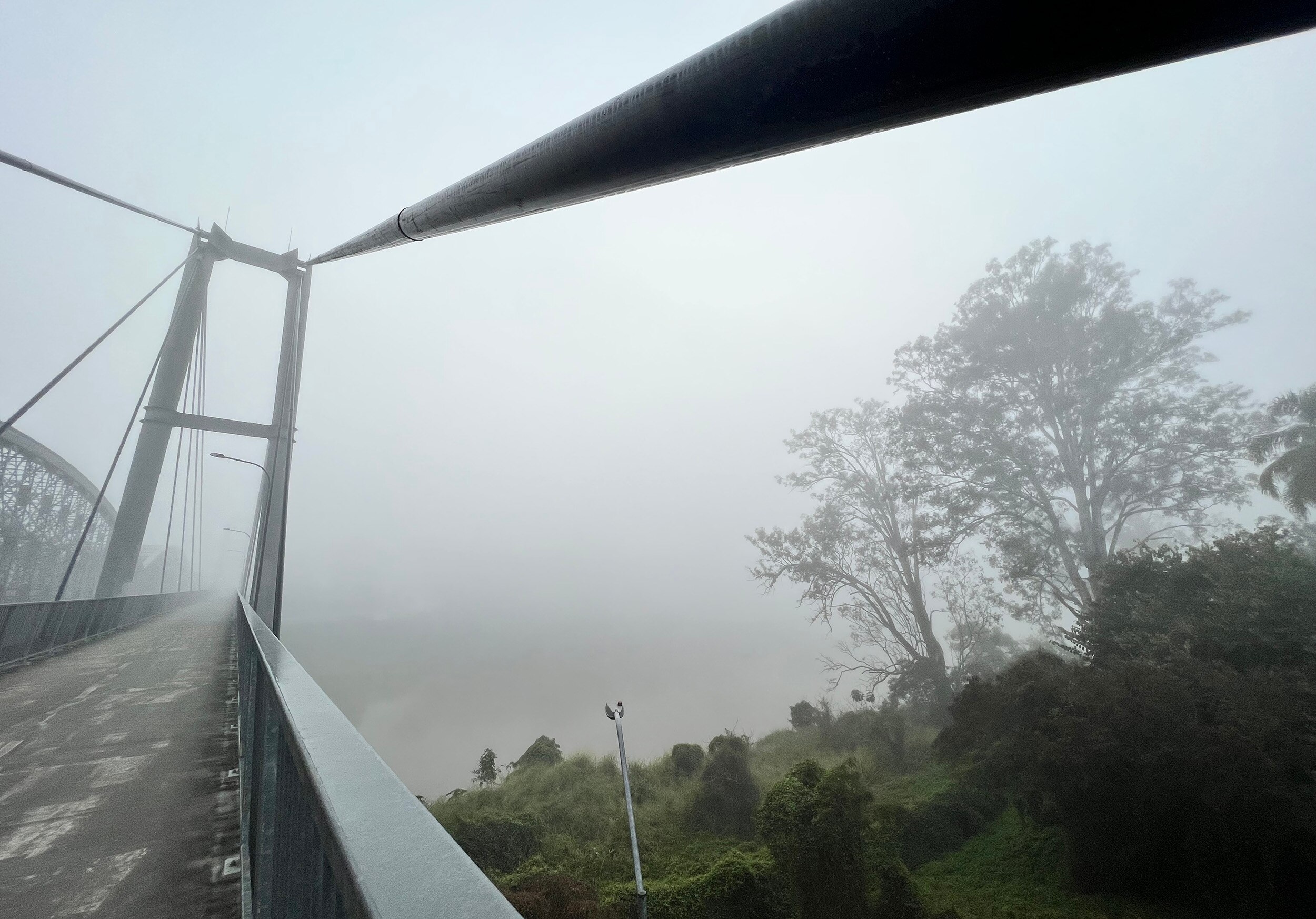 The pedestrian and cycle bridge at Indooroopilly in fog shroud