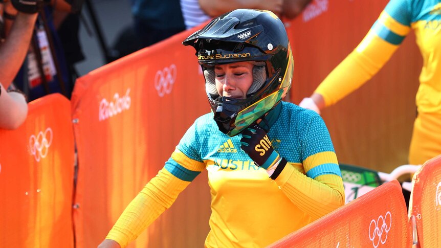 Australia's Caroline Buchanan reacts after crashing out in the semi-finals of women's Olympic BMX.
