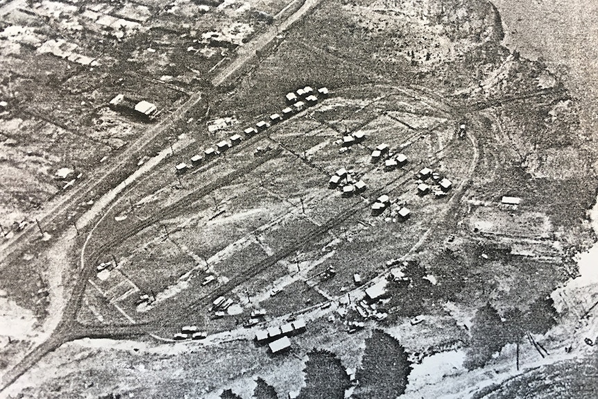 Aerial photo of tents on football oval.
