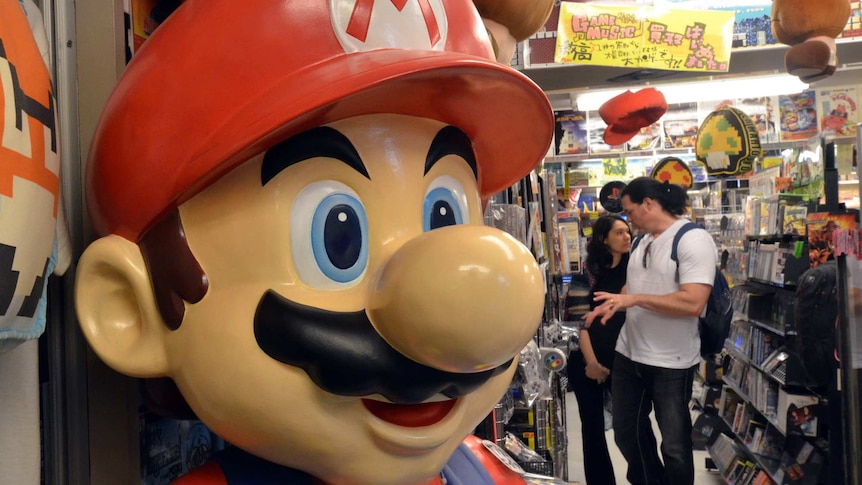 Super Mario figurine in Japanese video game shop