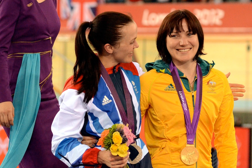 Victoria Pendleton congratulates Anna Meares on the podium at the London 2012 Olympic Games.