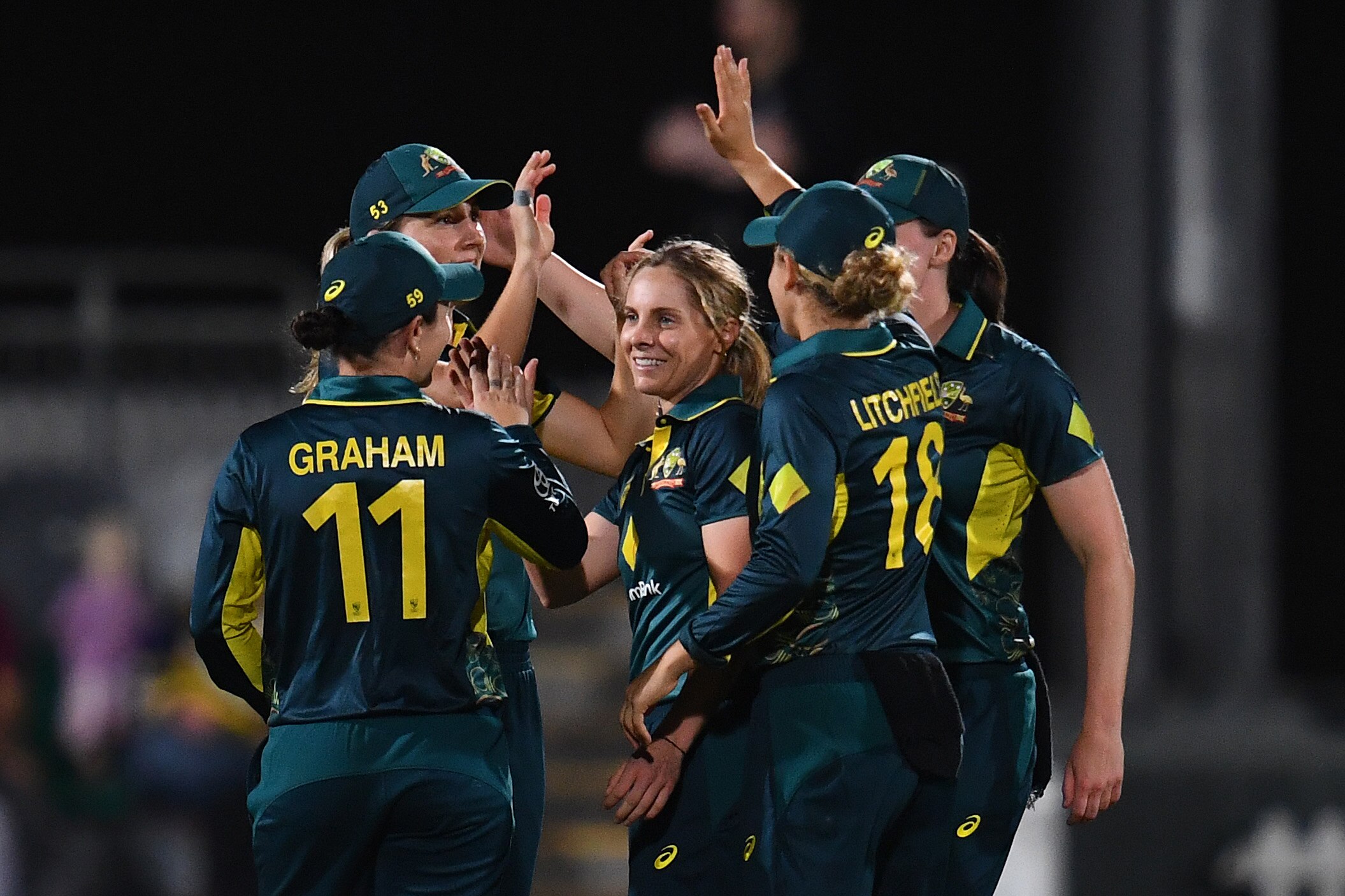Australia celebrates a wicket against New Zealand in the women's T20.