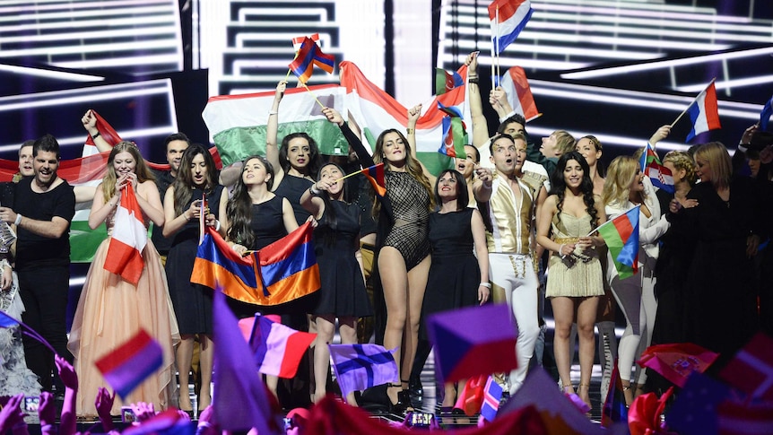 Eurovision finalists celebrate after the first semi-final