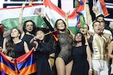 Eurovision finalists celebrate after the first semi-final