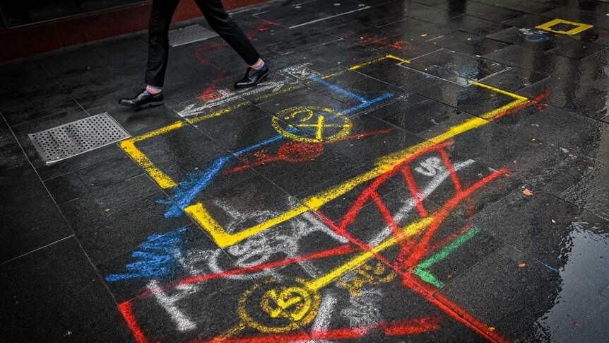 A footpath with different colours marked on it.