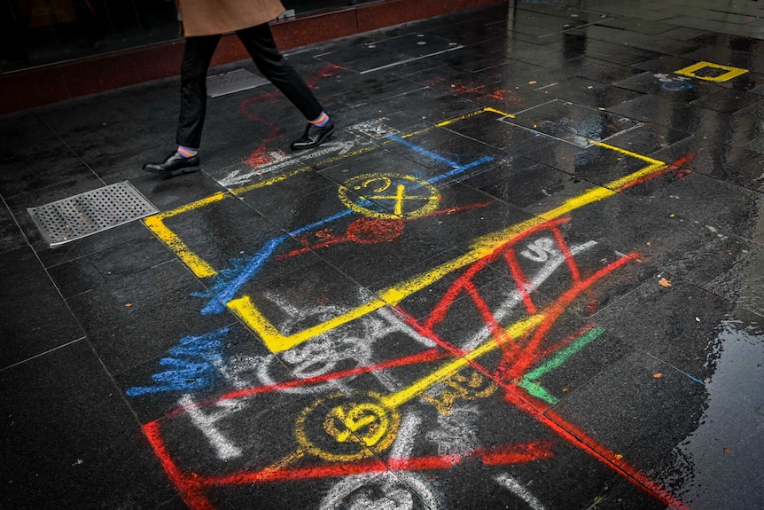 A footpath with different colours marked on it.