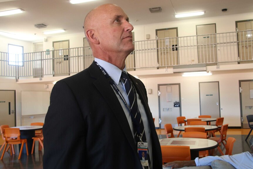 WA's Commissioner for Corrective Services James McMahon looks up inside Eastern Goldfields Regional Prison.