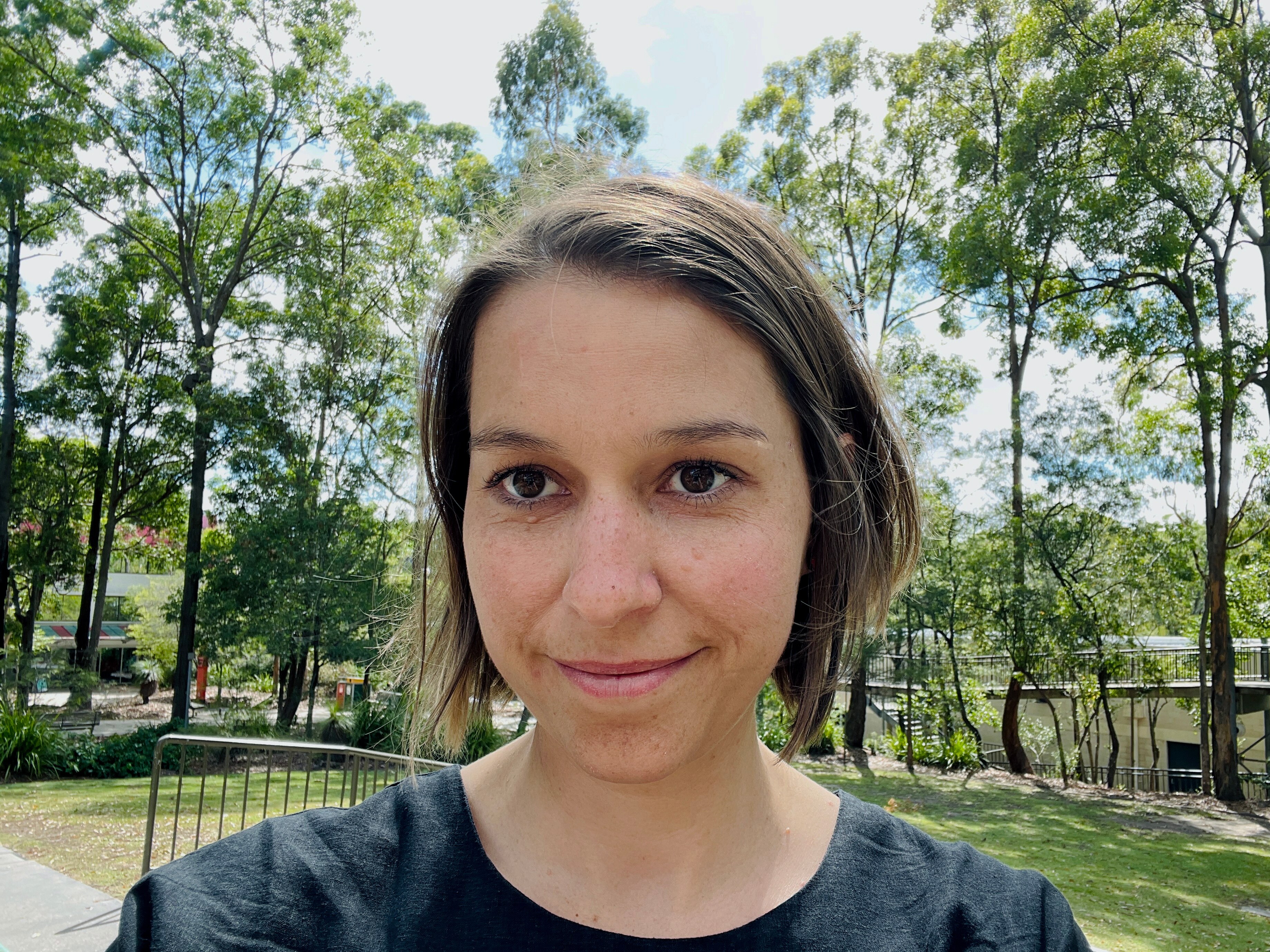 Woman smiling in foreground