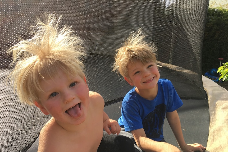 Lisa Bridger's two sons Phoenix and Chase on a trampoline.