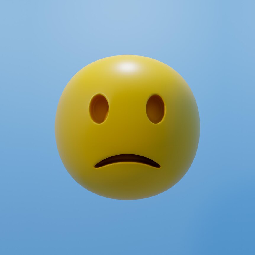 A sad face emoji on a blue background