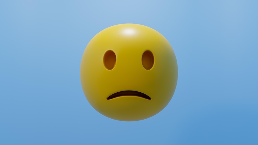 A sad face emoji on a blue background