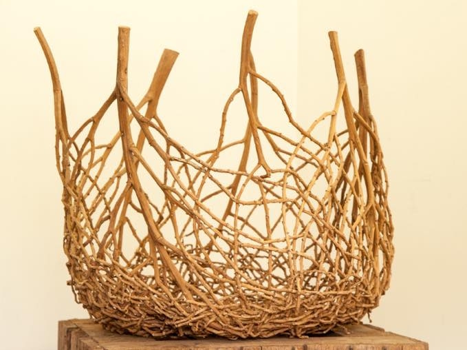 A basket made from parts of dried palms.