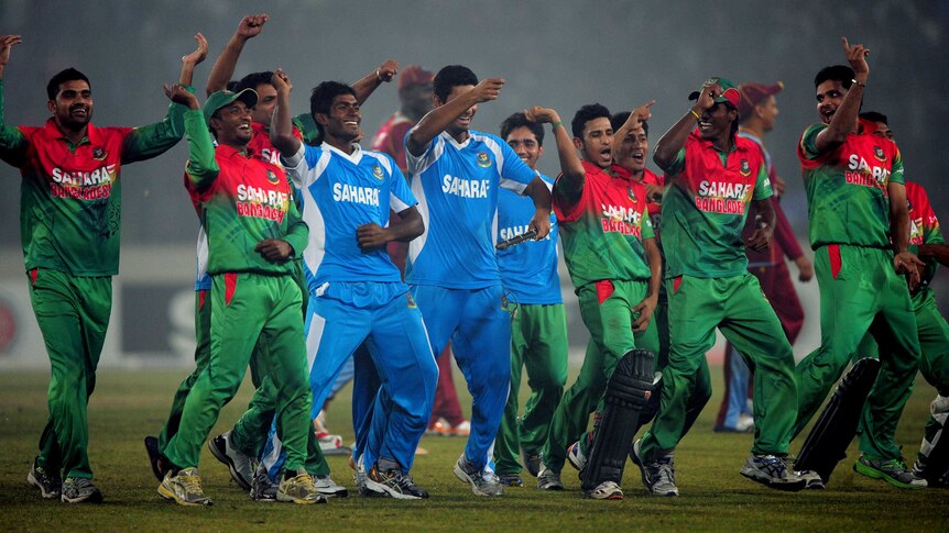 Bangladeshi cricketers celebrate their 3-2 series win over the West Indies.