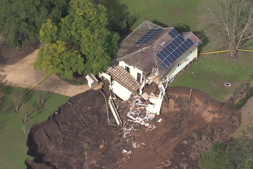 A house on the edge of a sinkhole